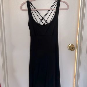 Black strapped back dress.